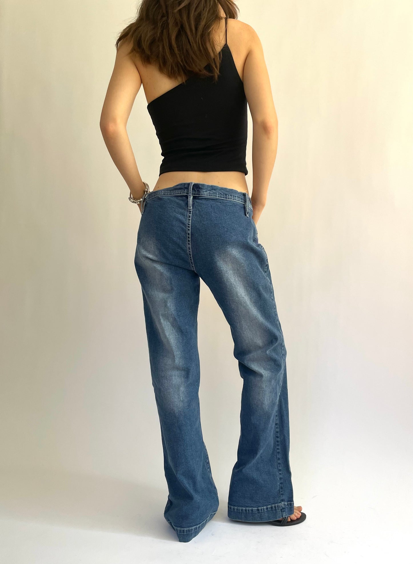 Iconic Y2K low rise flared stretchy jeans with pocket detailing