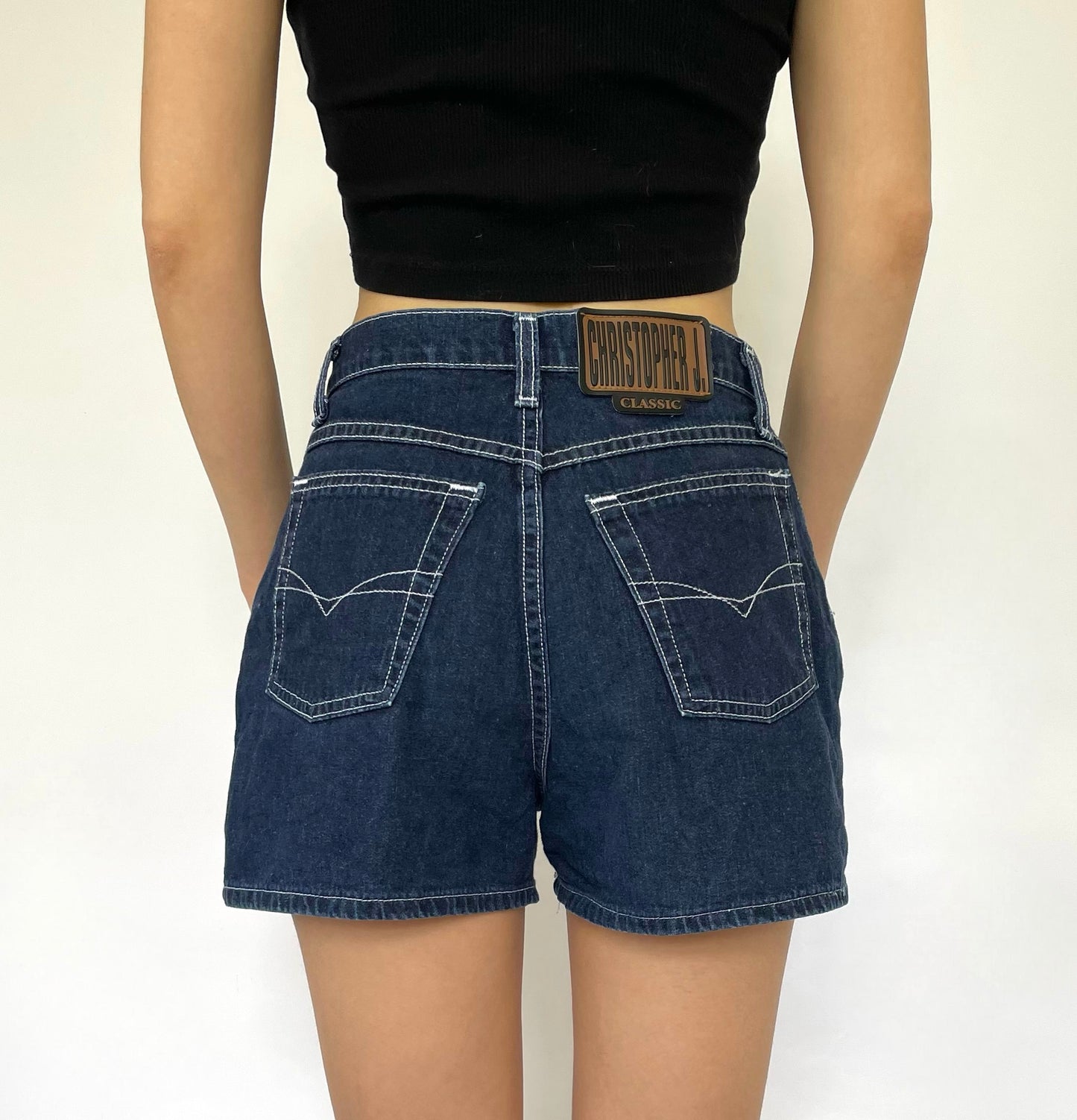 Vintage high waisted denim shorts in Dark wash