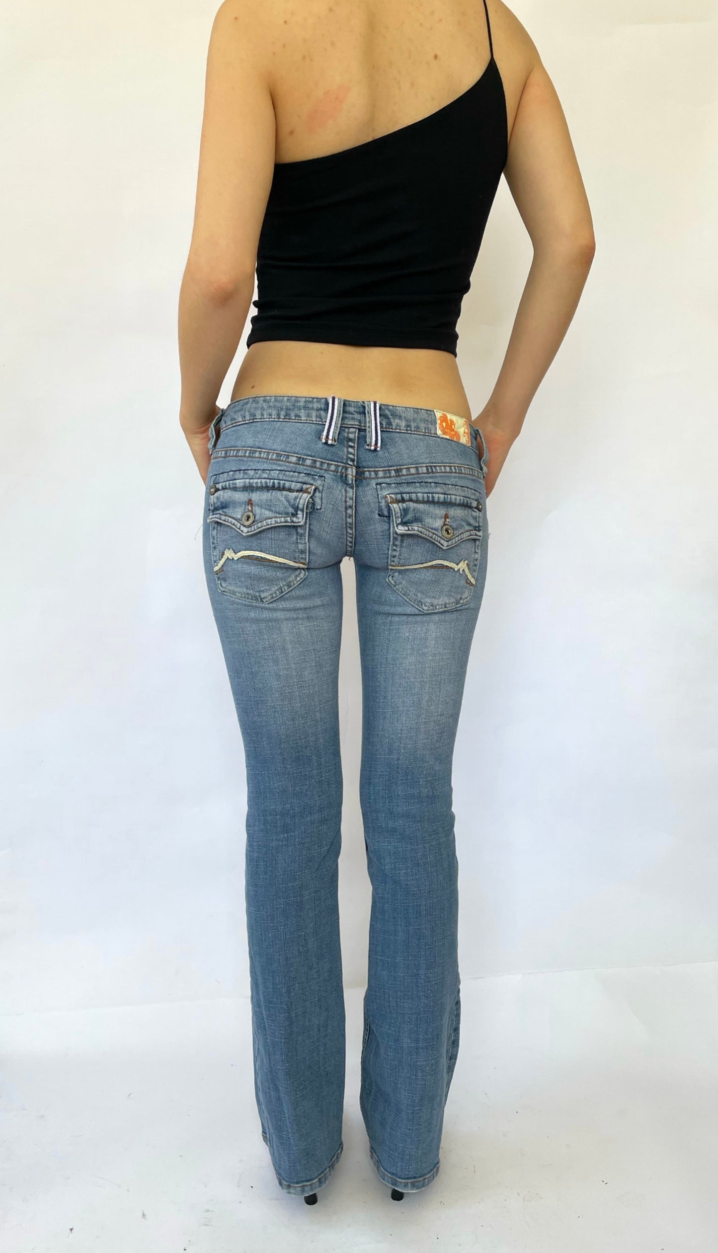 Y2K extra low rise jeans by DOLLHOUSE