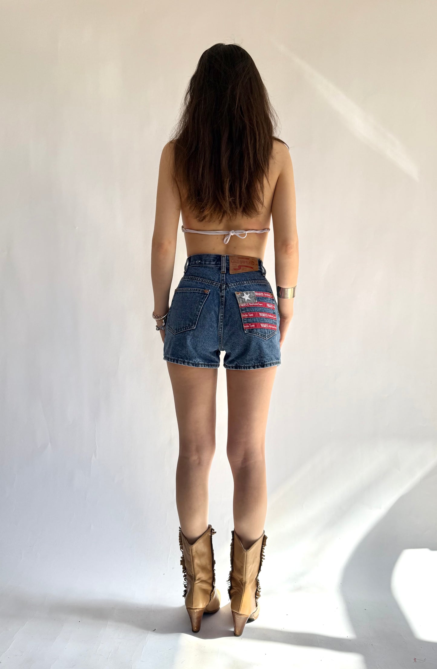 Insane vintage 90s High-waisted denim shorts with American flag patch by Request