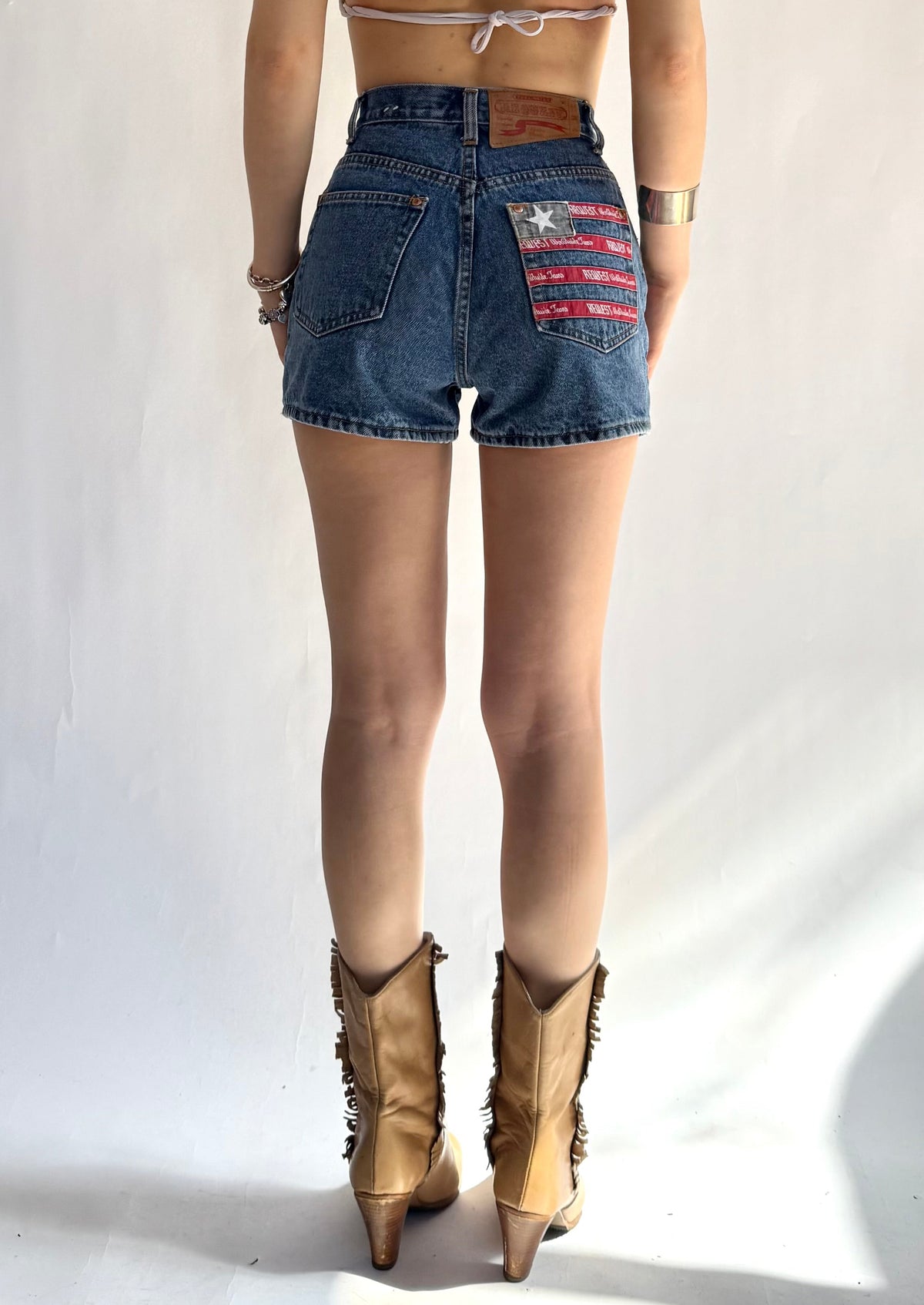 Insane vintage 90s High-waisted denim shorts with American flag patch by Request
