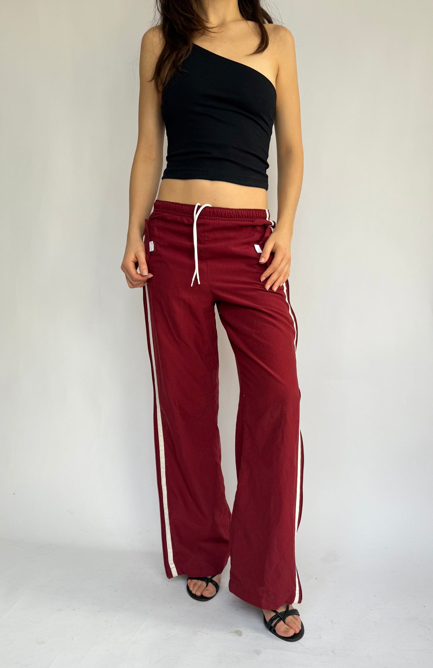 Y2k star print red track pants in size XS/S