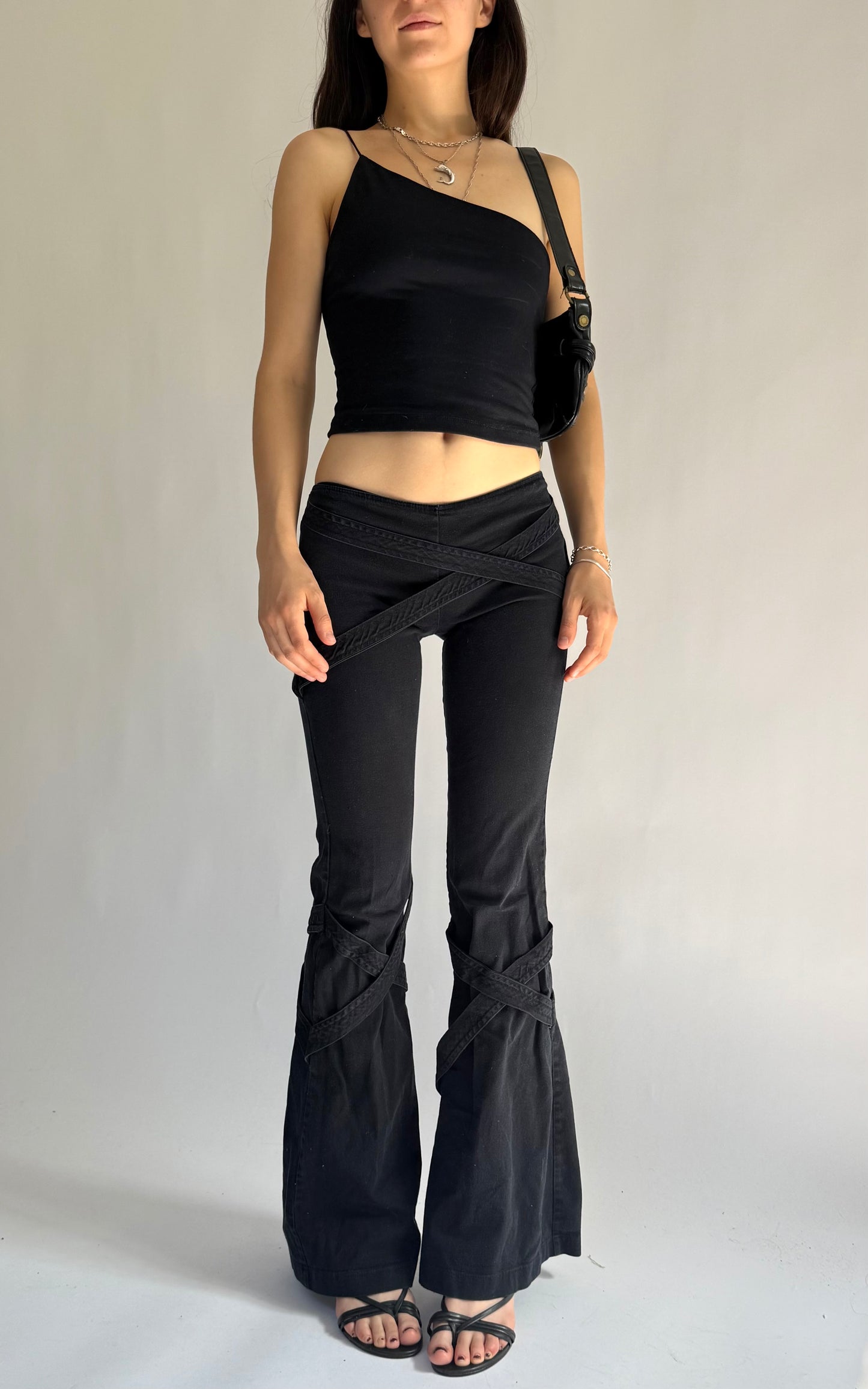 Y2K grunge core low rise flared pants with criss cross strap detailing