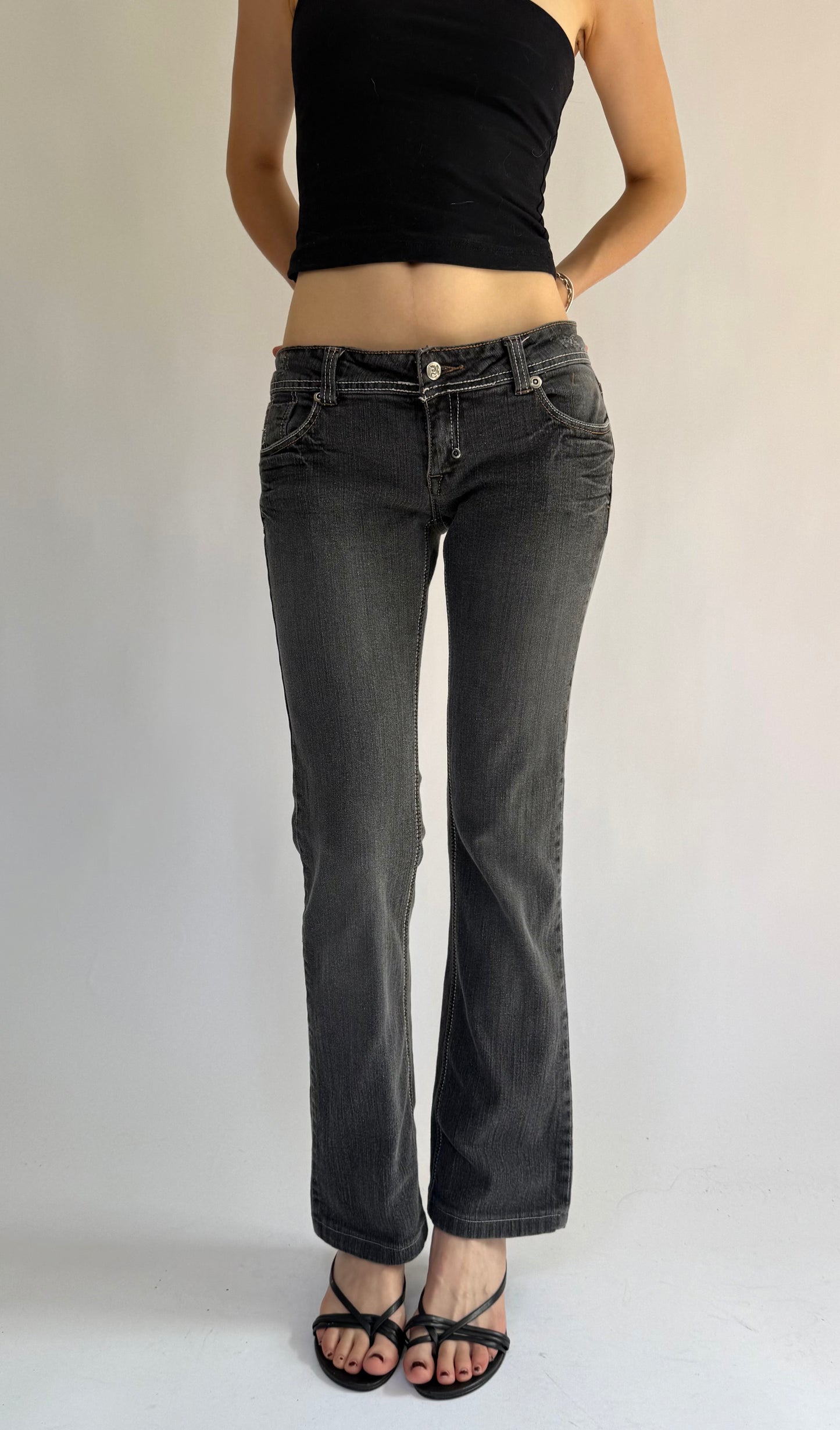 Y2K low rise flared black jeans with white stitching by FREE SOUL