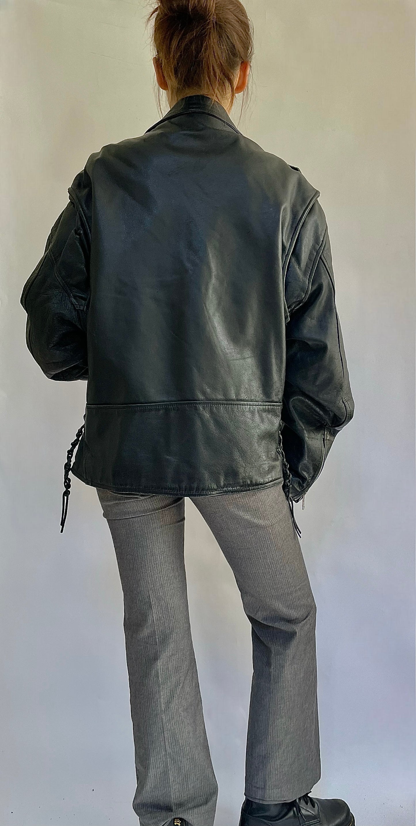 Vintage 1960s black motorcycle leather jacket