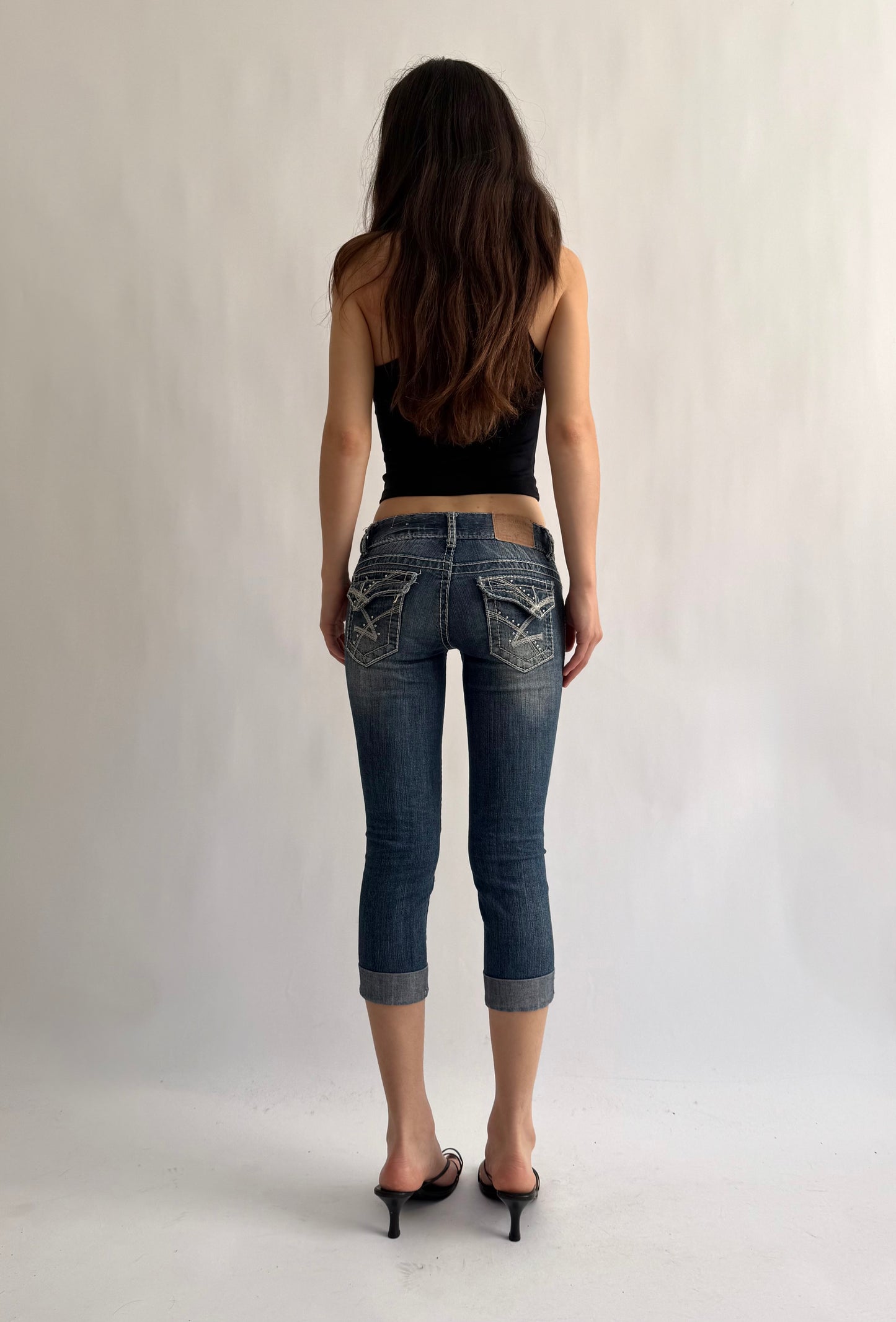 Y2K denim low rise capris with white stitching by Amethyst