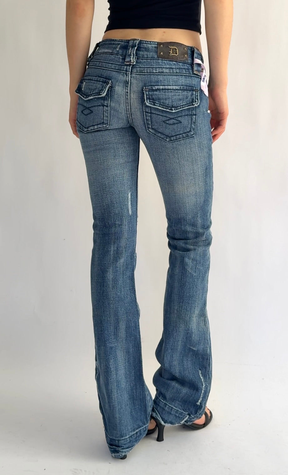 Y2K DEADSTOCK from the 2000s low rise flare jeans by DOLLHOUSE