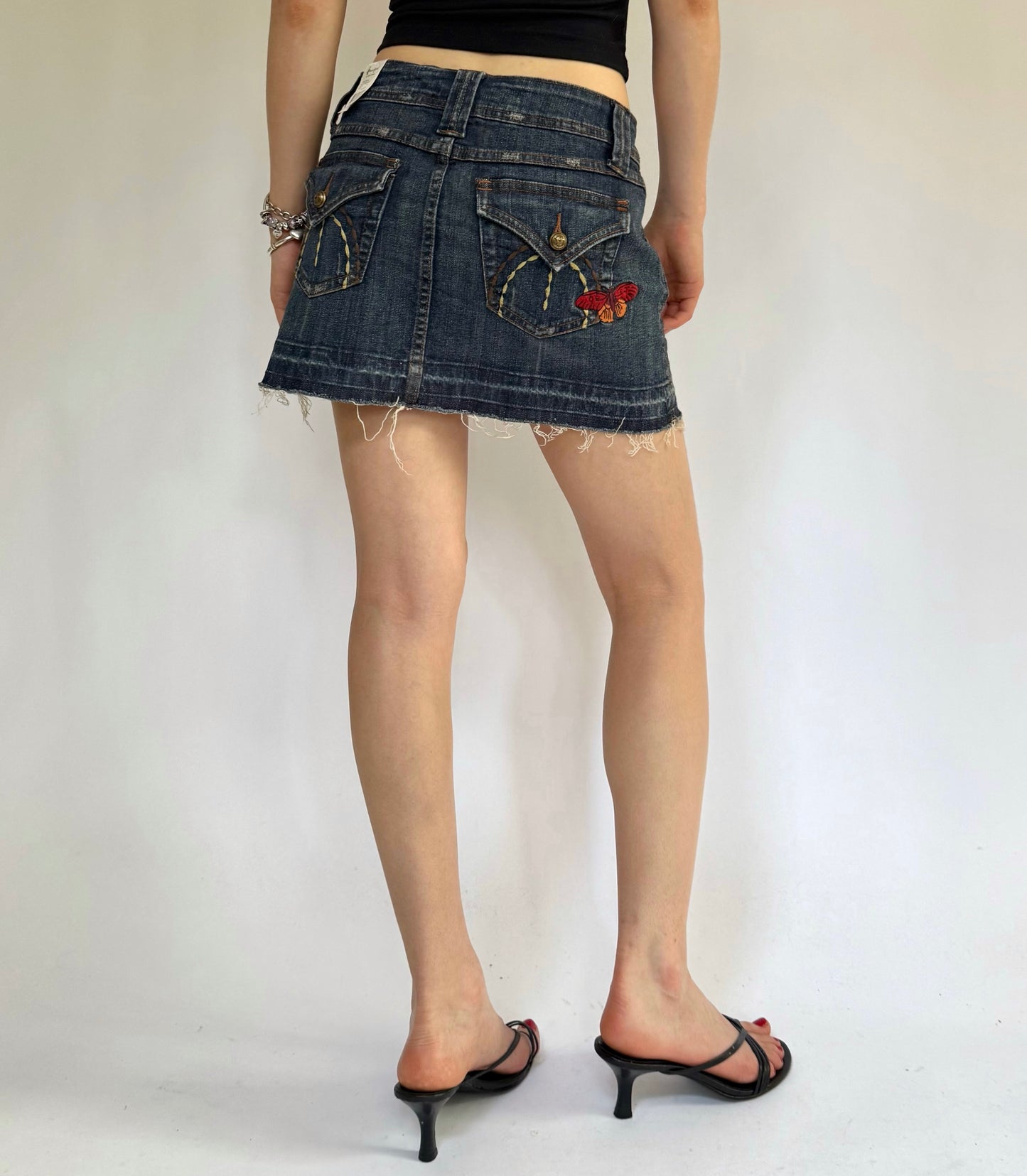 Y2K deadstock low rise dark wash denim mini skirt by soundgirl