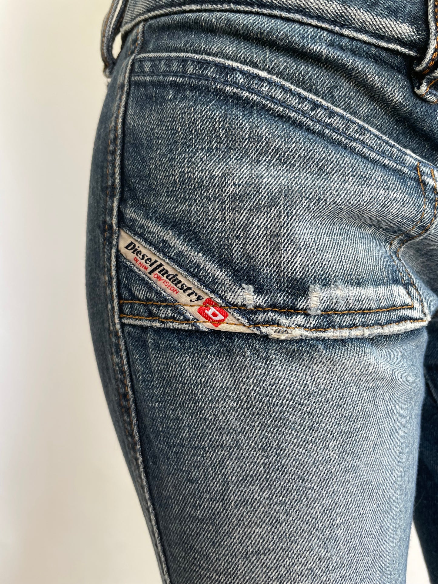 Y2K low rise jeans by DIESEL in dark blue