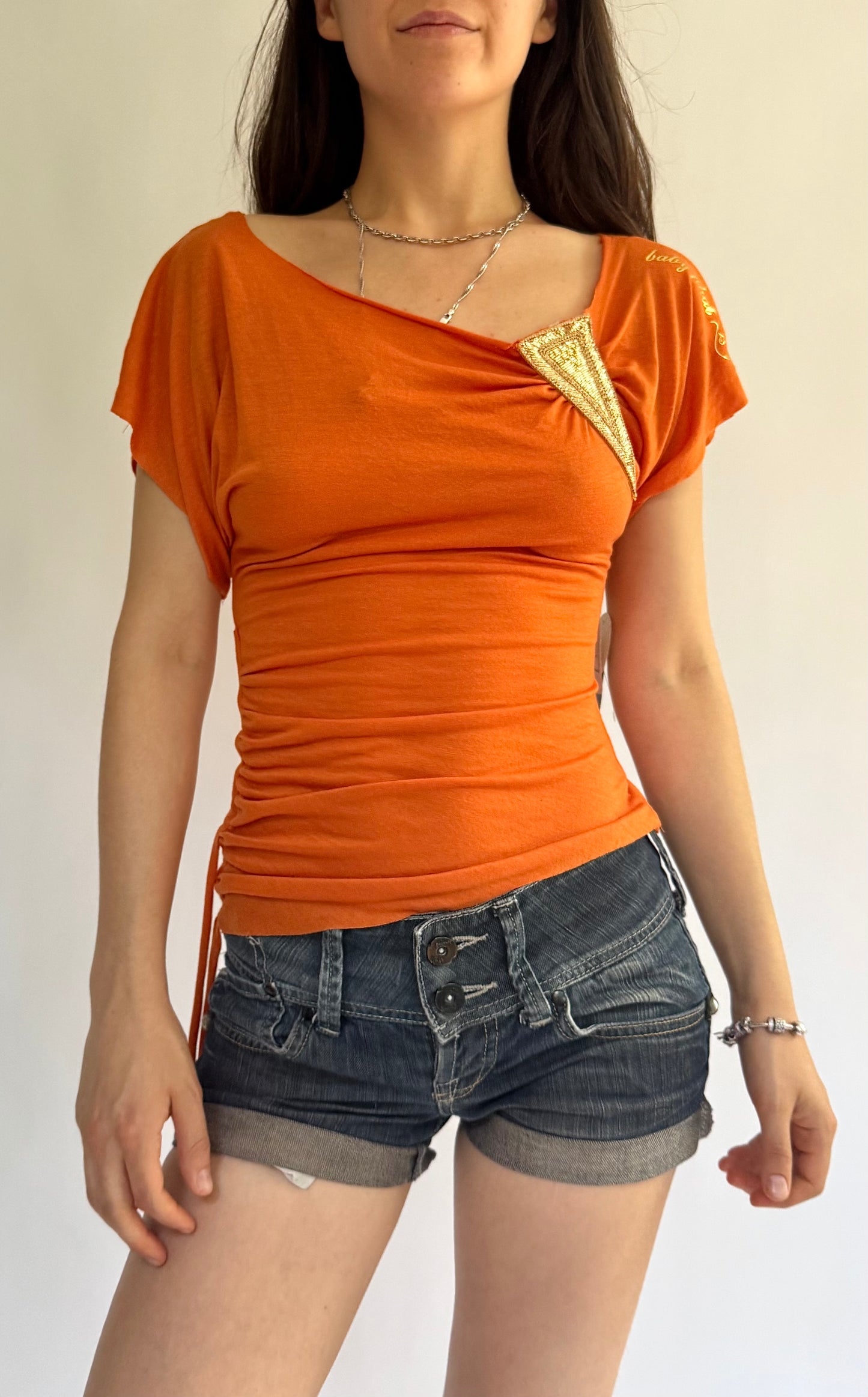 Y2K Deadstock BABYPHAT orange off the shoulder top with gold detailing and side tie