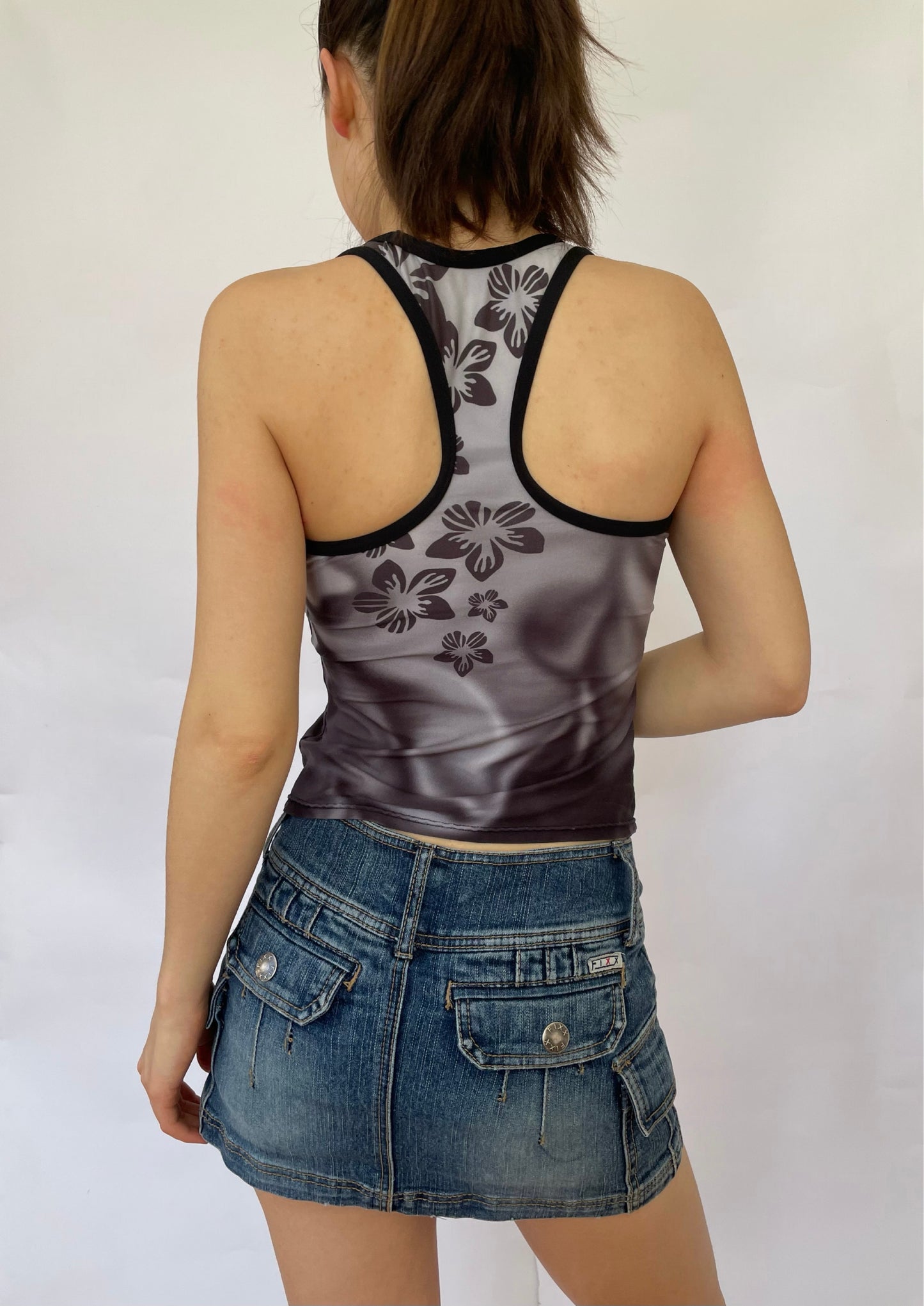 Early 2000s white and grey swirled tank