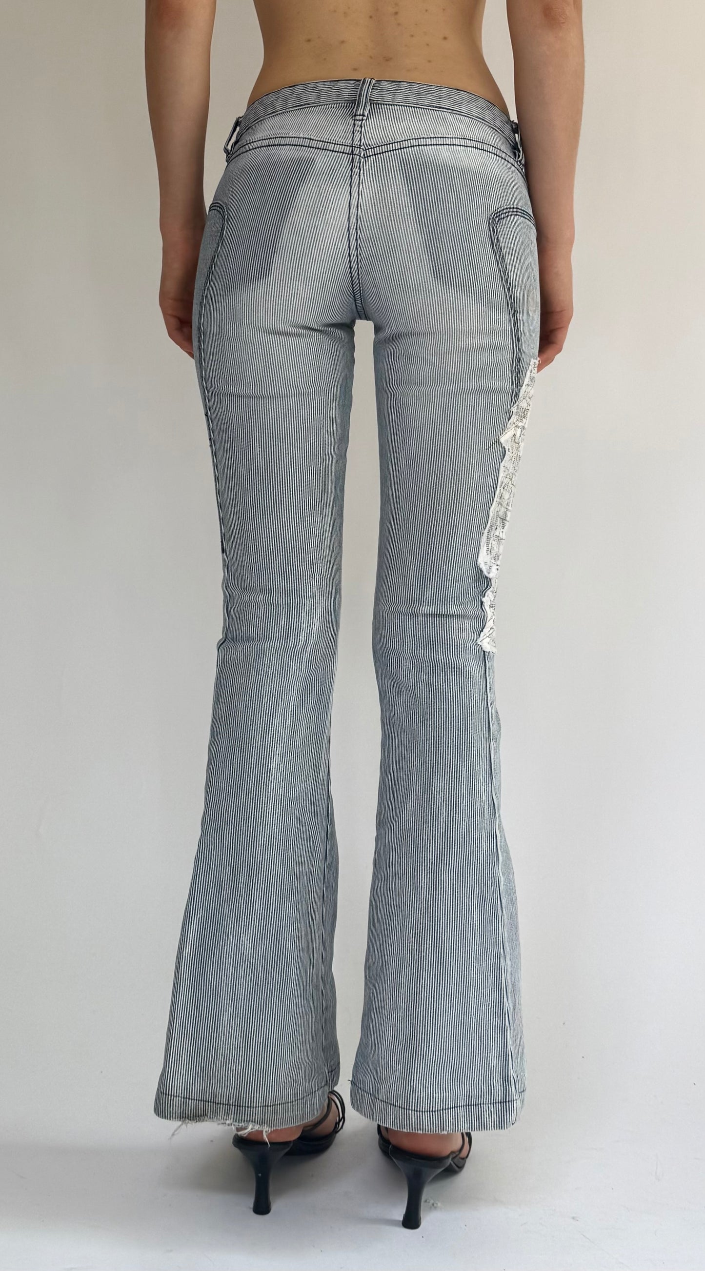 Y2K rare low rise flared jeans by brand BEBE