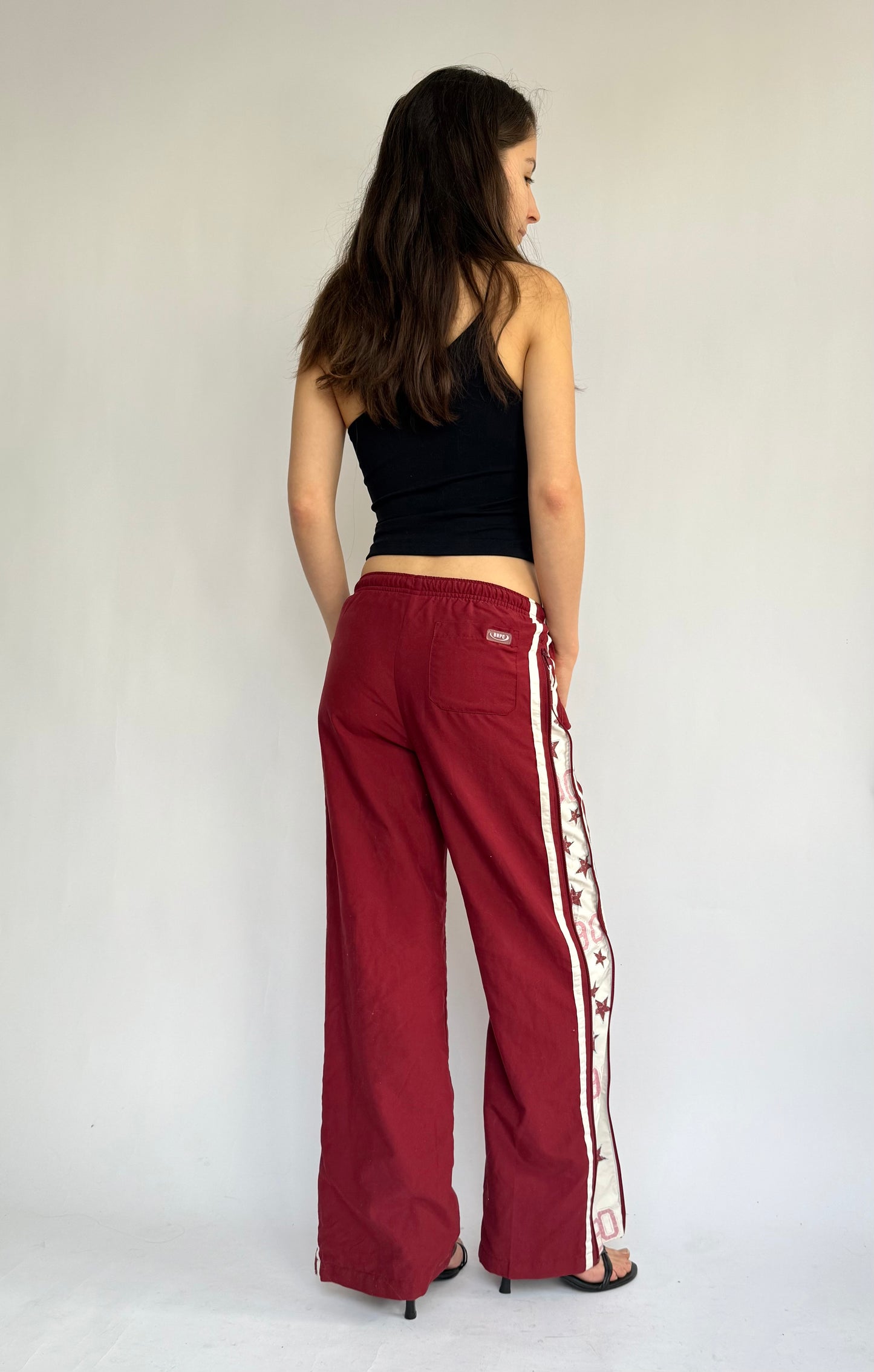 Y2k star print red track pants in size XS/S