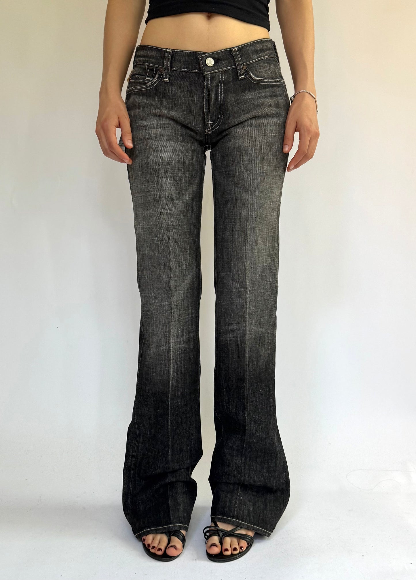 Y2K DEADSTOCK black low rise flare jeans with a faded finish