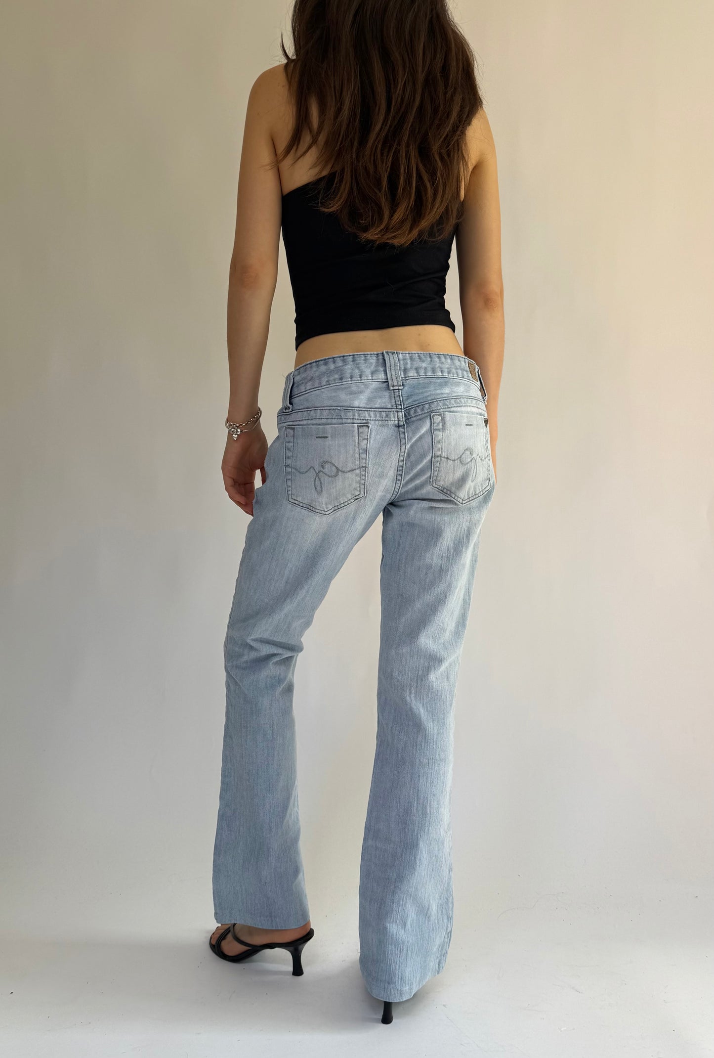 Y2K GUESS low-rise light wash denim jeans with a flare leg