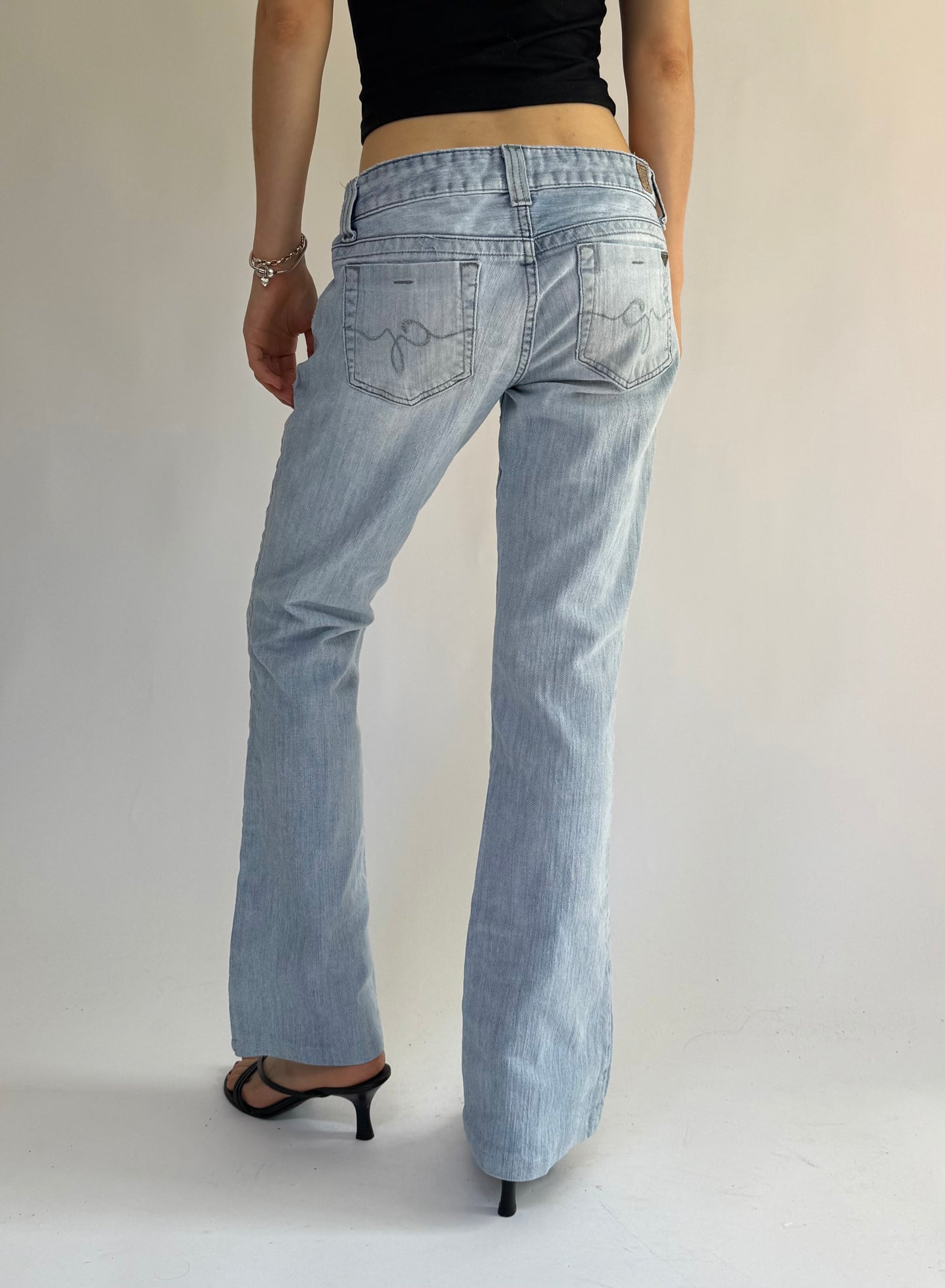 Y2K GUESS low-rise light wash denim jeans with a flare leg