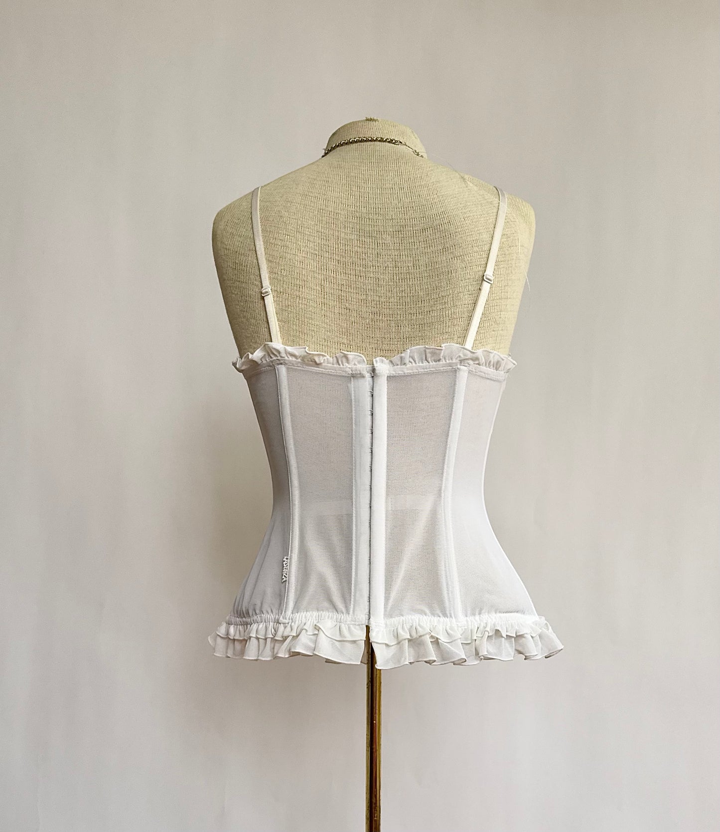 Y2K white corset top with ruffles