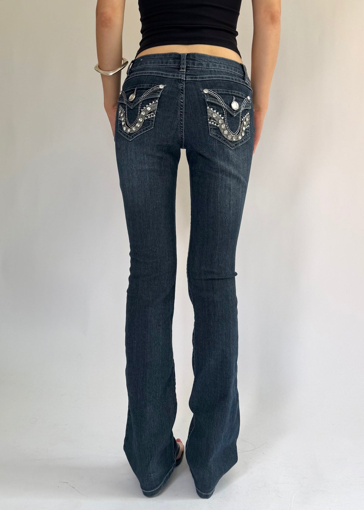 Y2K low rise flared jeans with rhinestone details By BLUE SPICE