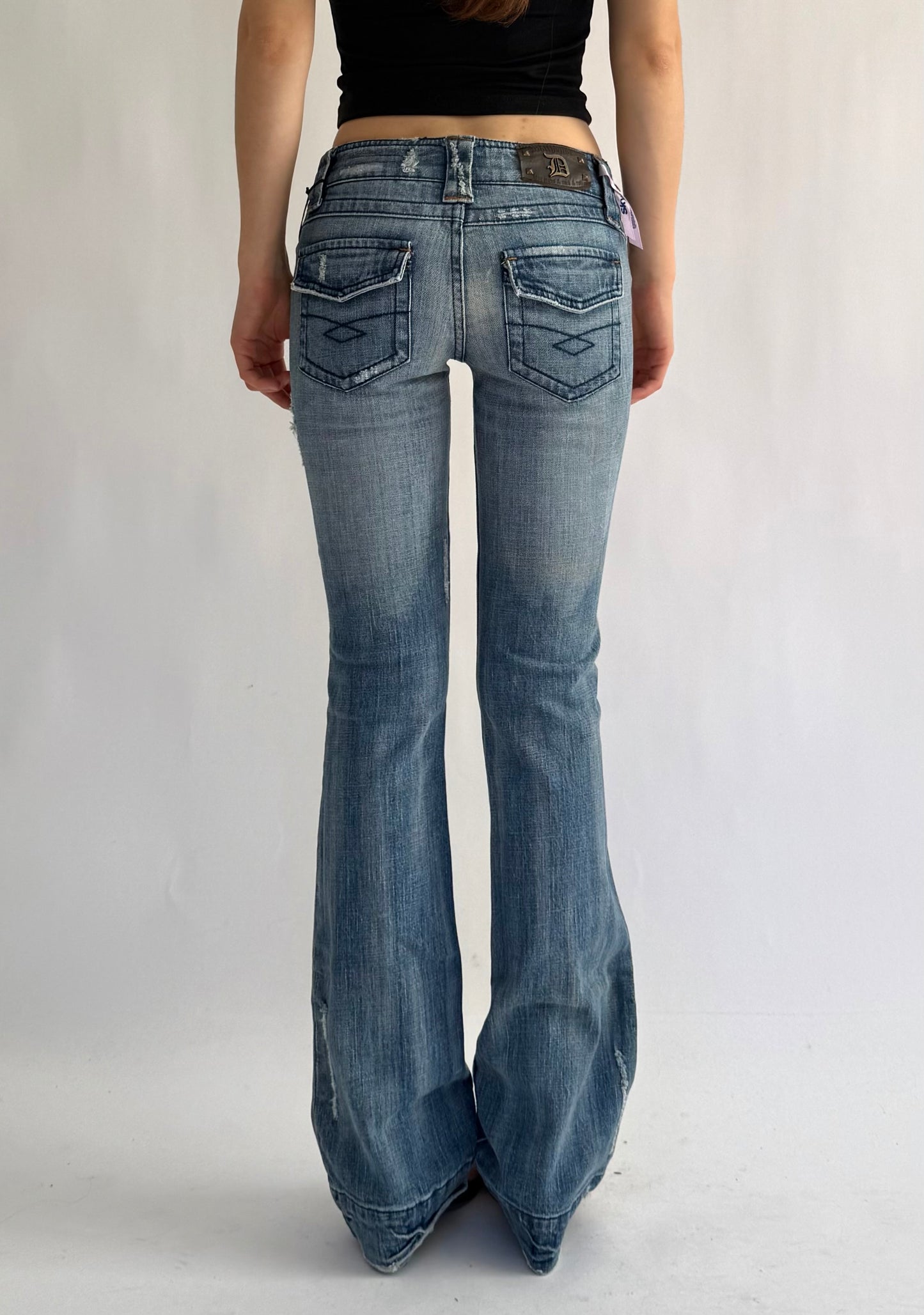 Y2K DEADSTOCK from the 2000s low rise flare jeans by DOLLHOUSE