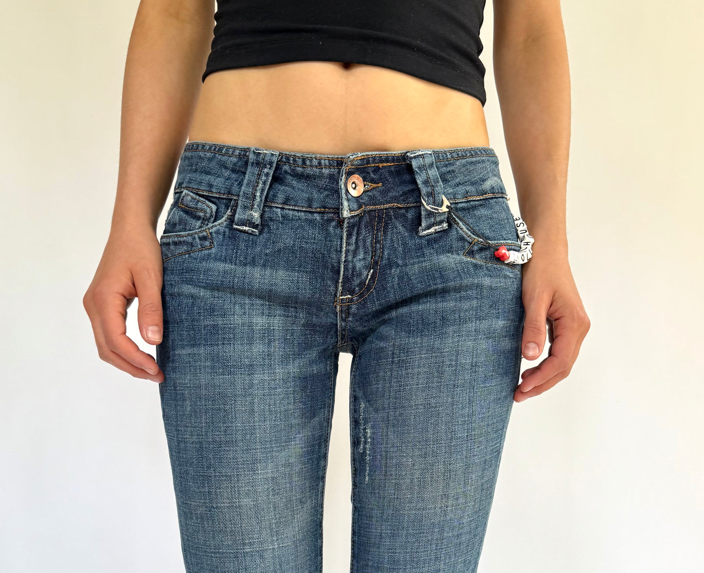 Y2K DEADSTOCK from the 2000s low rise flare jeans by DOLLHOUSE