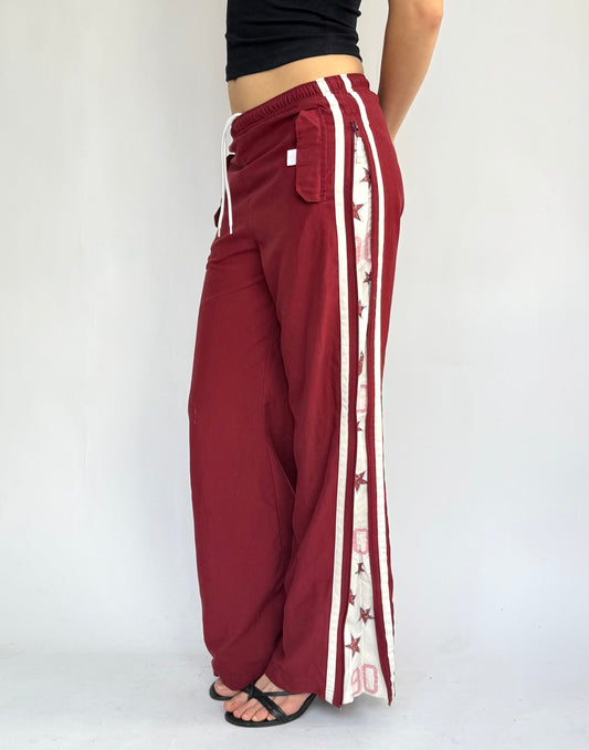 Y2k star print red track pants in size XS/S