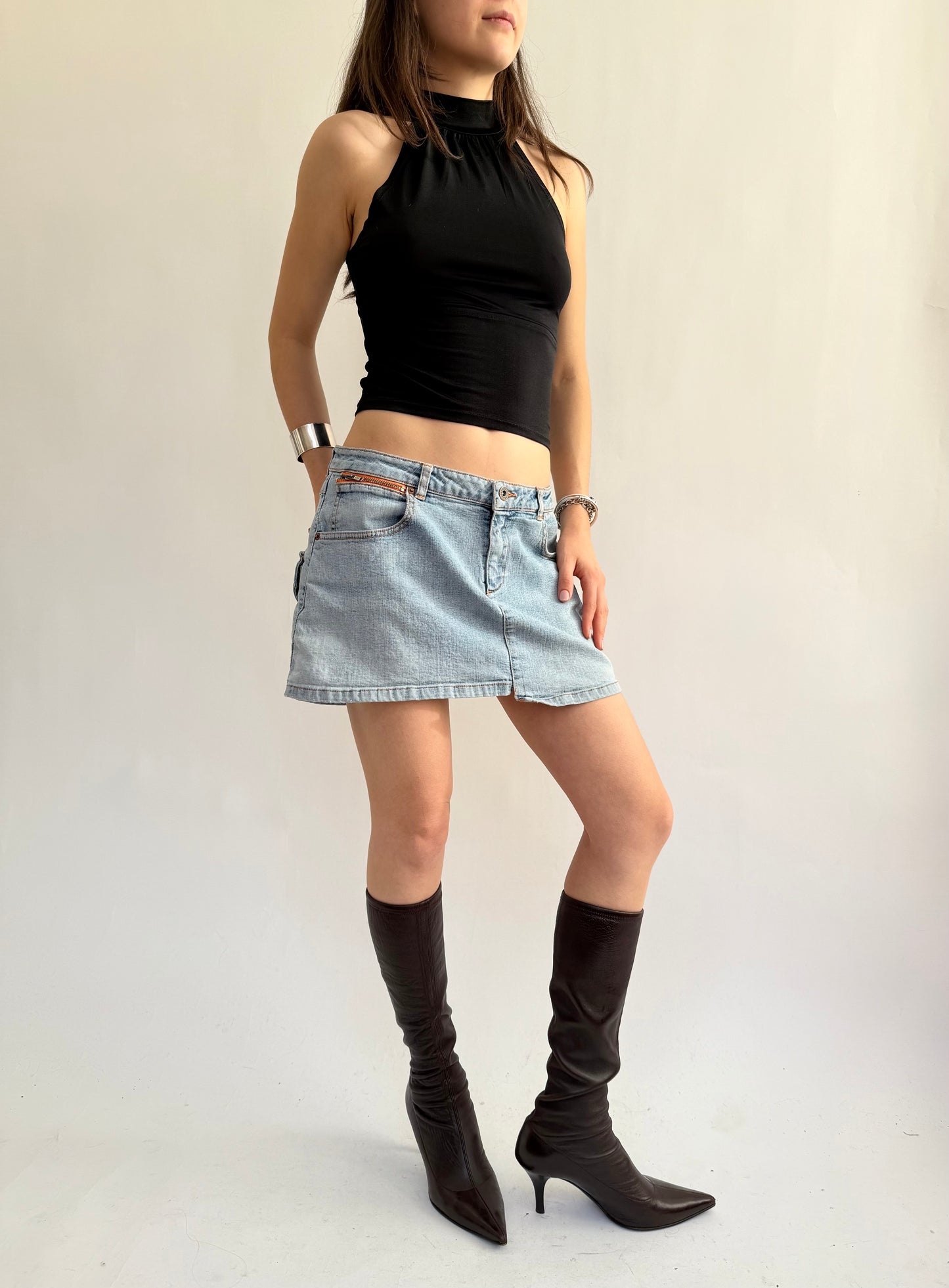 Y2K light wash denim mini skirt with back pocket details