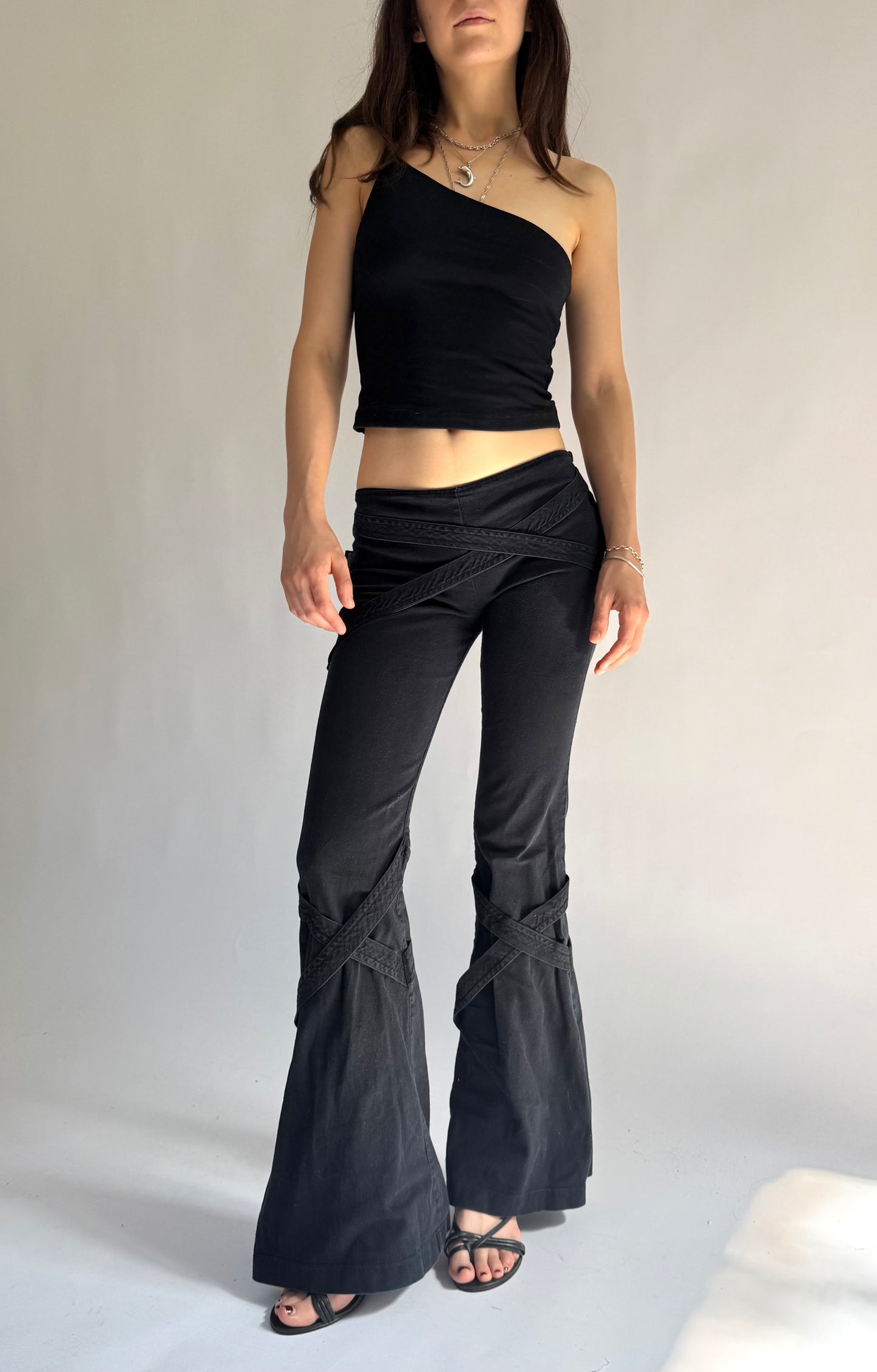 Y2K grunge core low rise flared pants with criss cross strap detailing