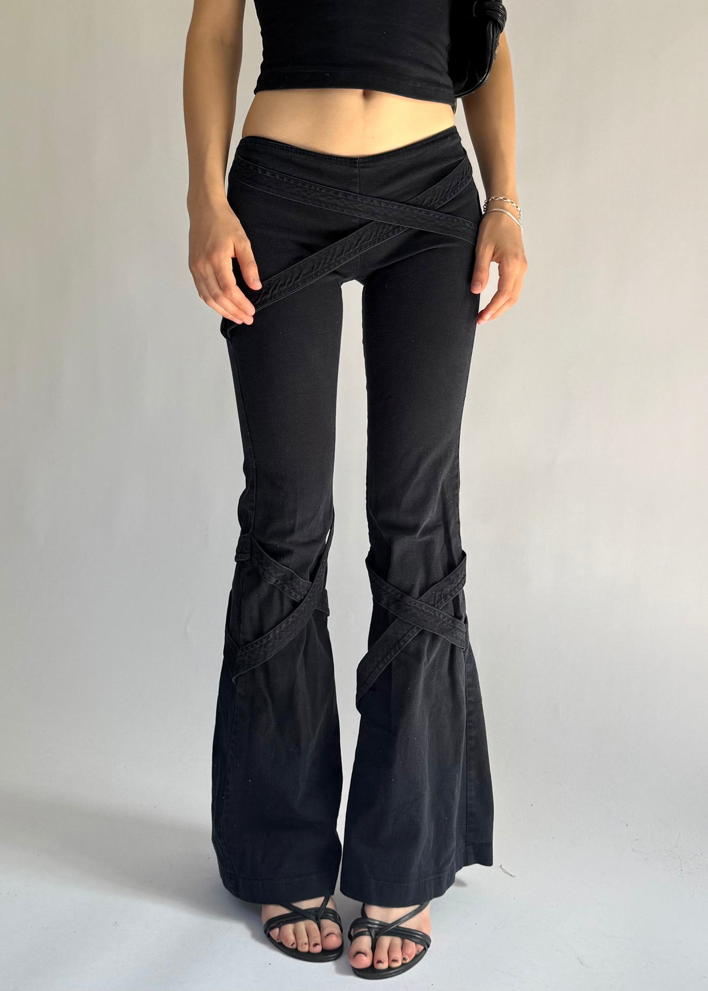 Y2K grunge core low rise flared pants with criss cross strap detailing