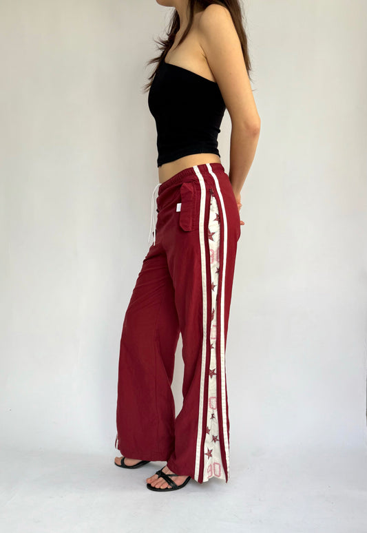 Y2k star print red track pants in size XS/S