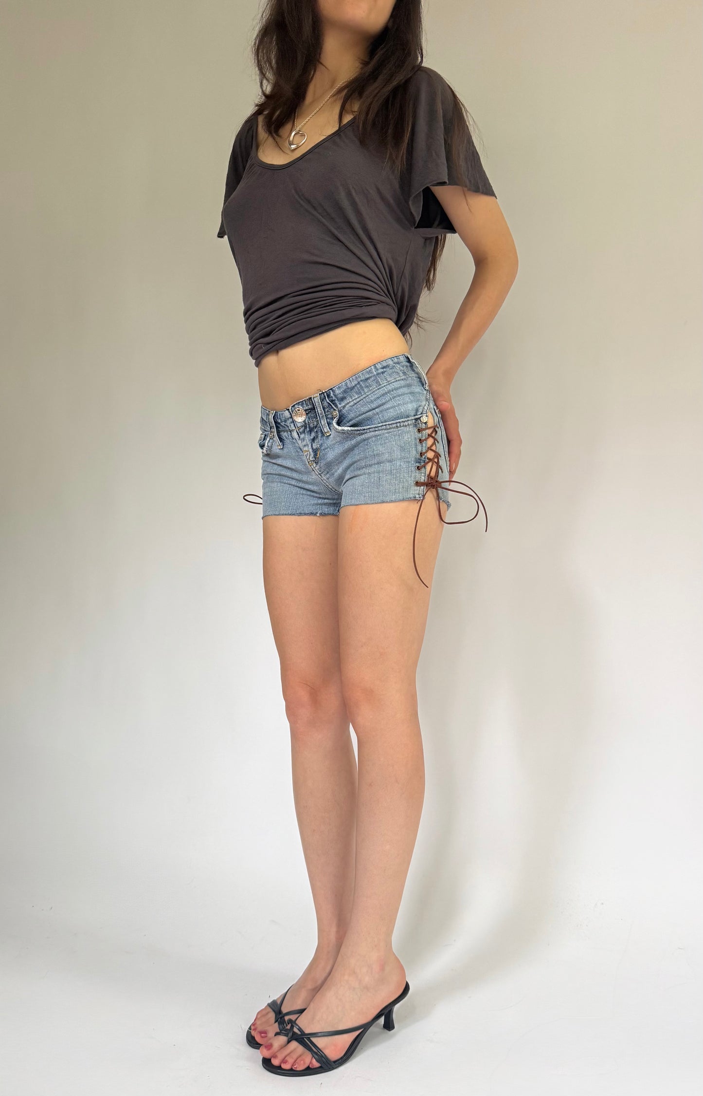 Y2K reworked extra low rise denim shorts with lace up detail