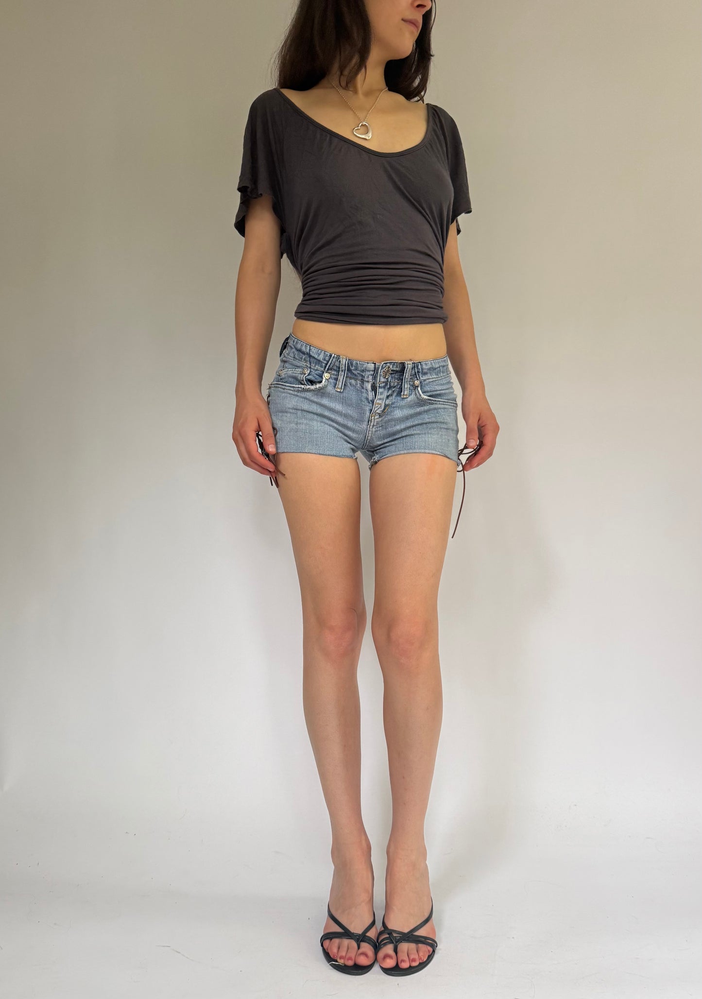 Y2K reworked extra low rise denim shorts with lace up detail