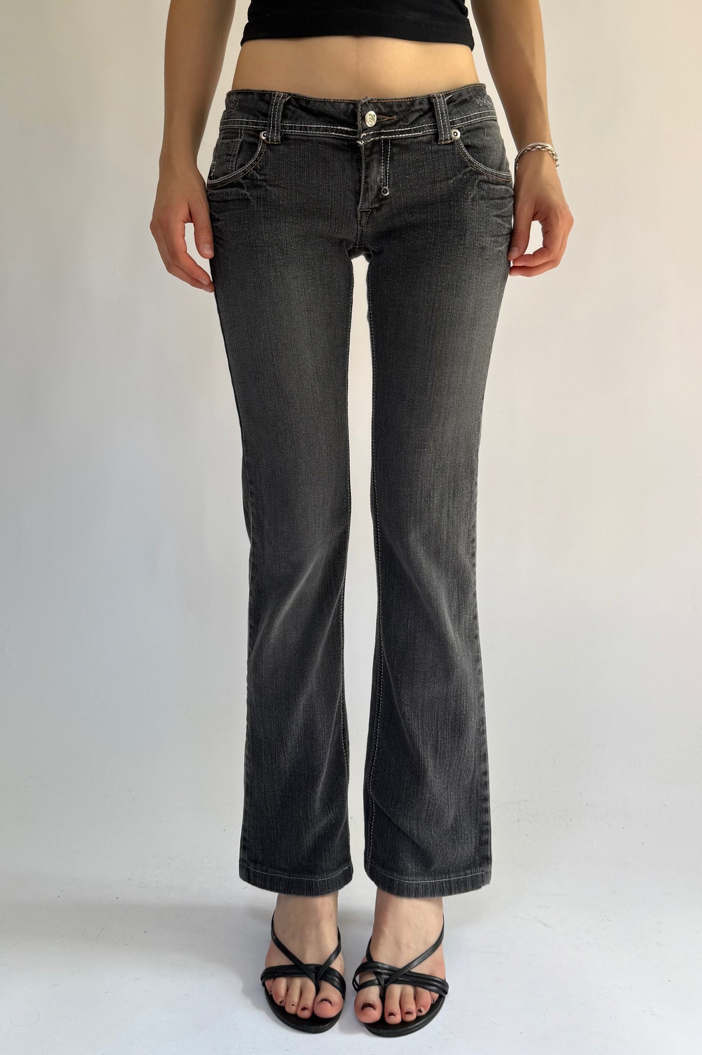 Y2K low rise flared black jeans with white stitching by FREE SOUL