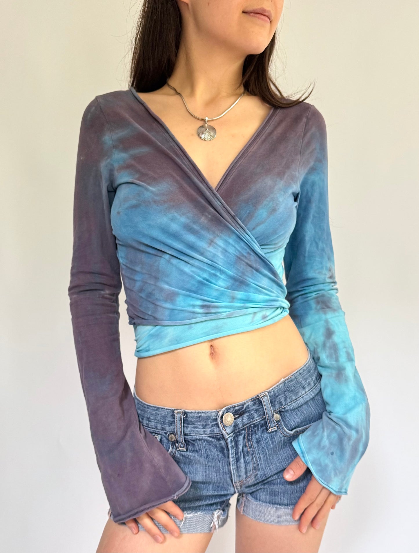 Y2K blue and purple tie-dye wrap top with long sleeves and tie front