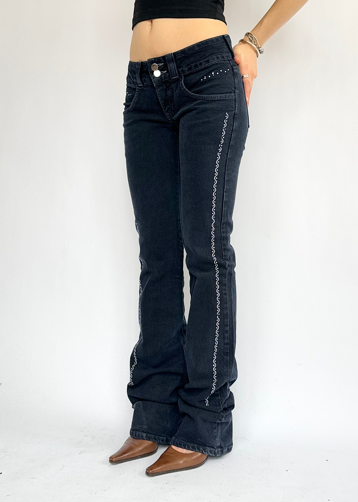 Y2K dark wash low rise flared jeans with silver studs
