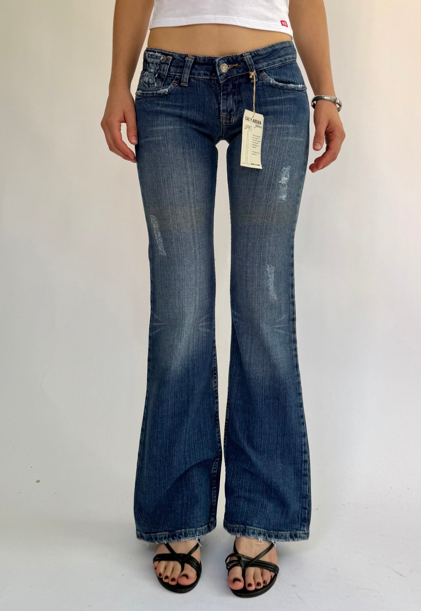 Y2K DEADSTOCK with tags low rise flared jeans by CAL Y ARENA