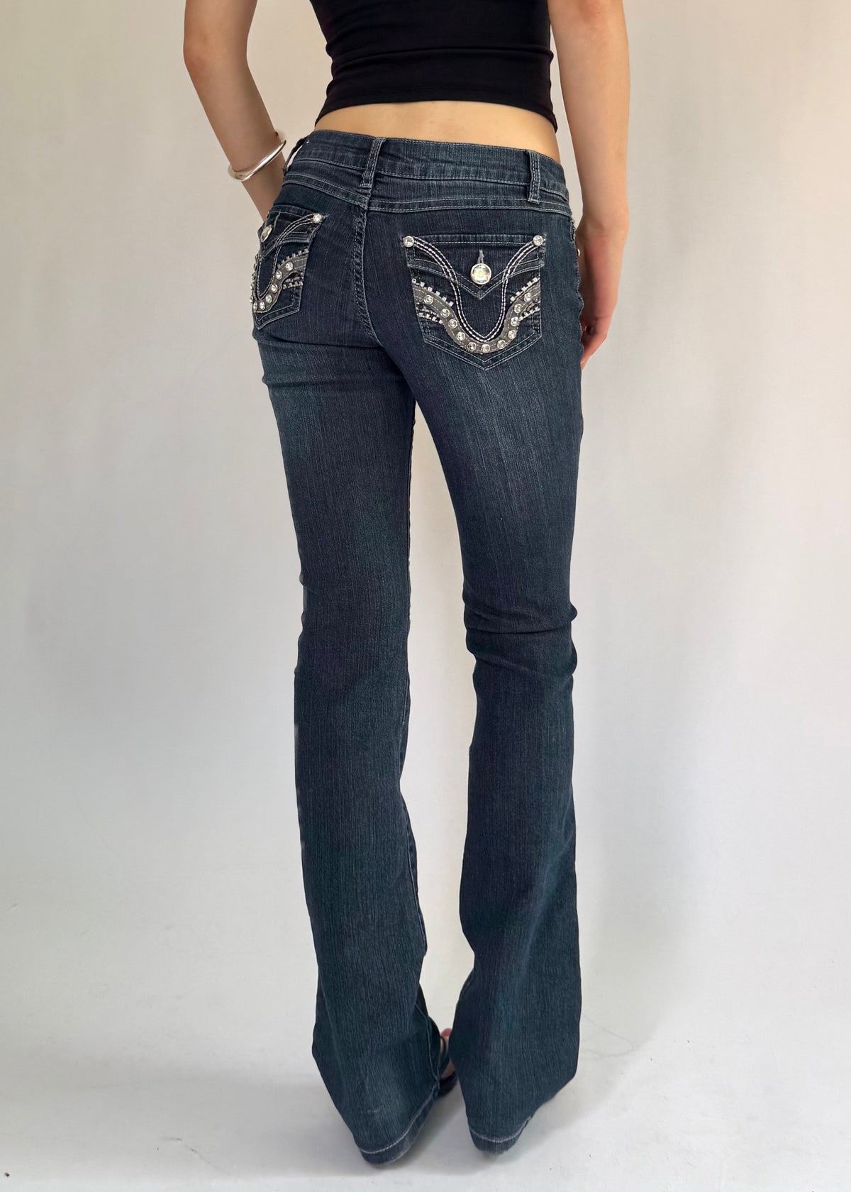 Y2K low rise flared jeans with rhinestone details By BLUE SPICE