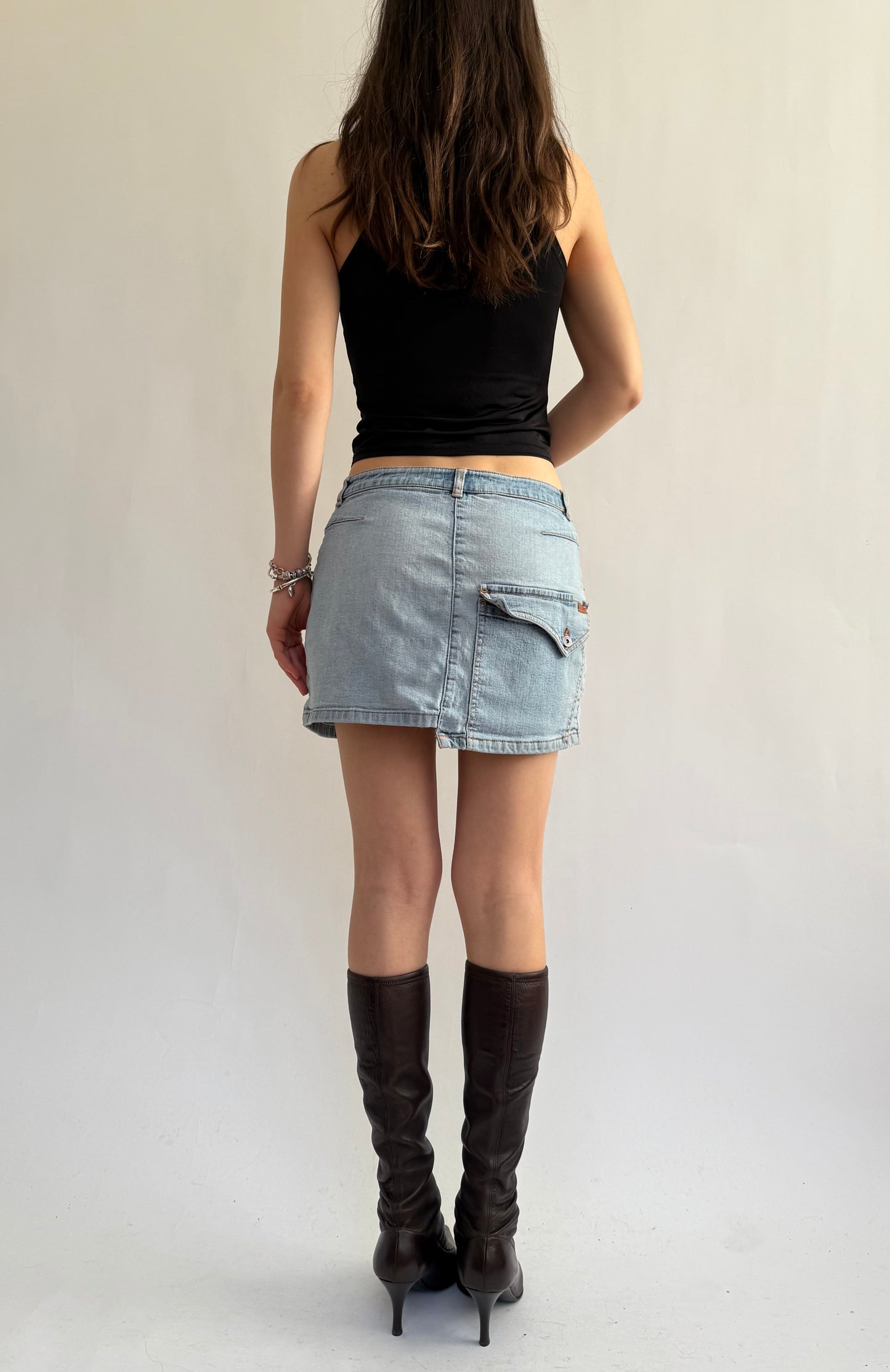 Y2K light wash denim mini skirt with back pocket details