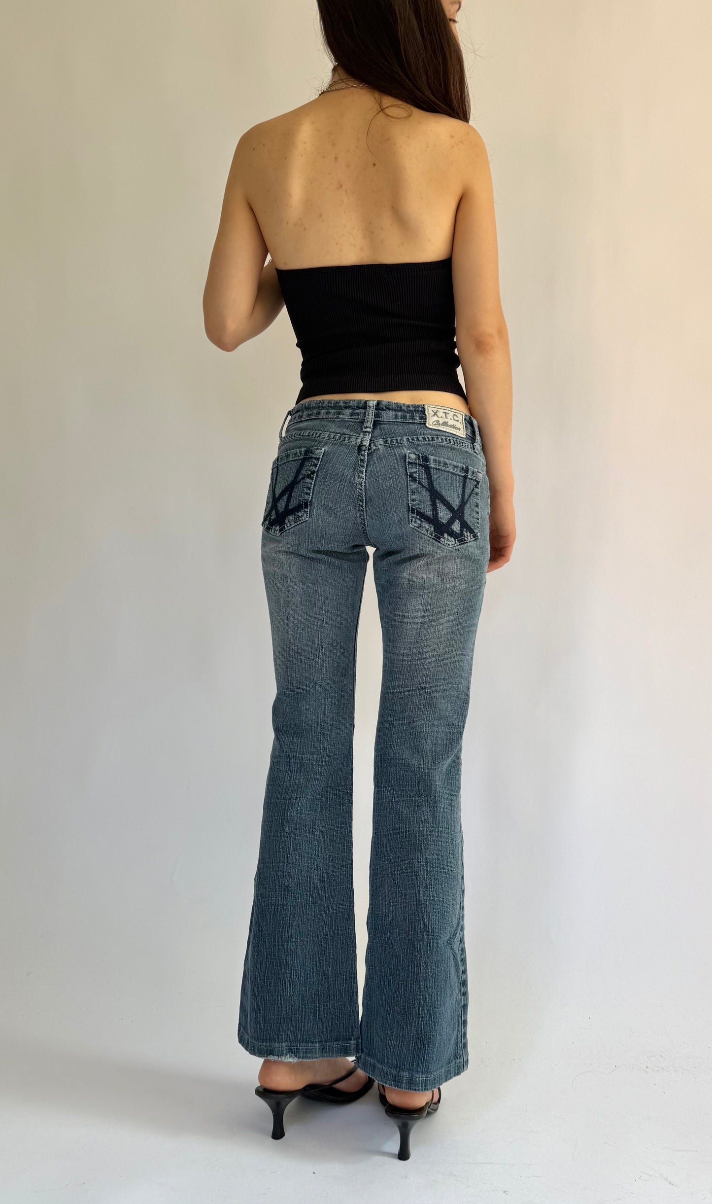 Y2K Low rise flare jeans with acid prints by XTC JEANS