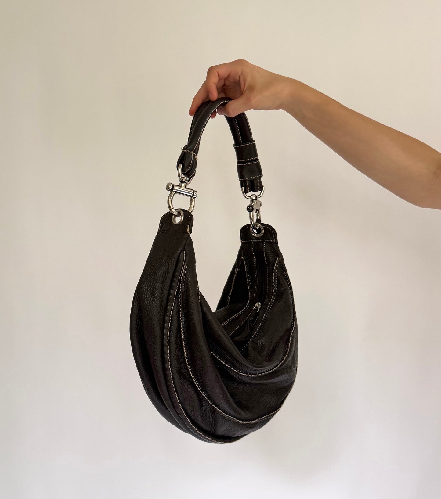 Y2K/2000s black genuine leather hobo bag with silver hardware and tassel detail