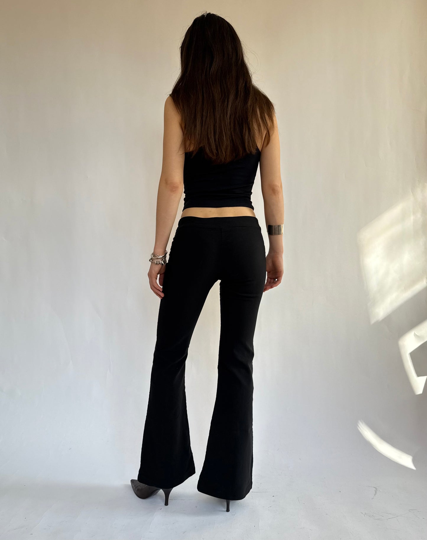 Y2K Black flared bootcut low rise trousers with silver zippers by XOTIC
