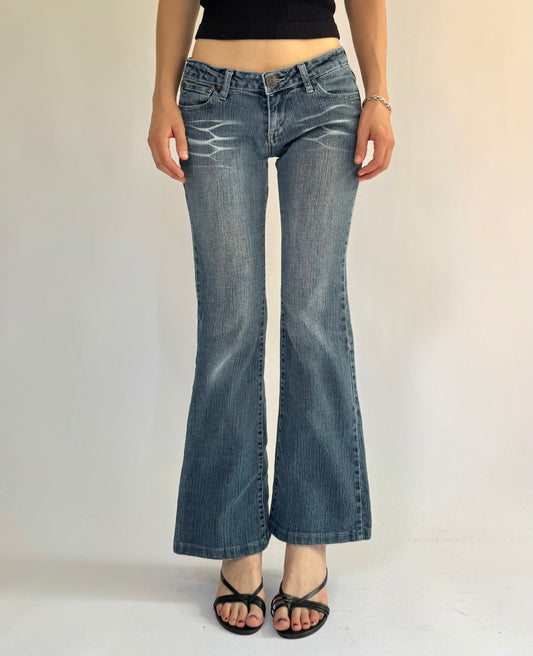 Y2K Low rise flare jeans with acid prints by XTC JEANS