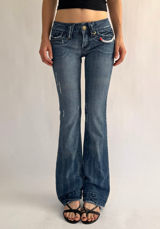 Y2K DEADSTOCK from the 2000s low rise flare jeans by DOLLHOUSE