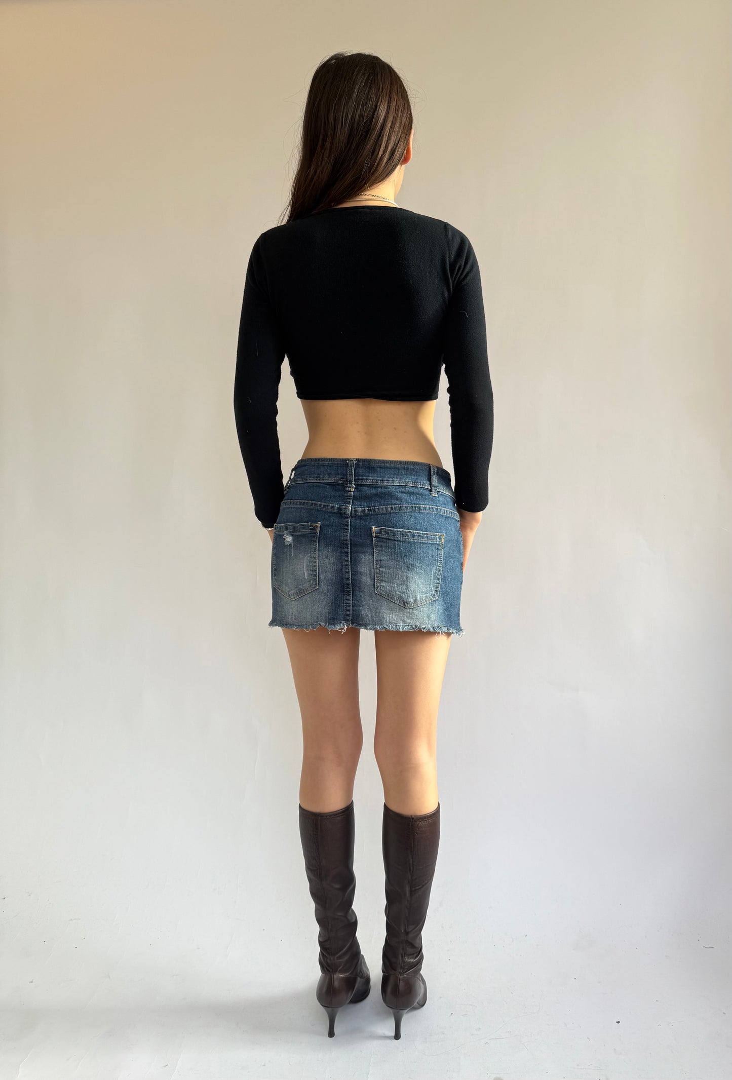 2000s distressed mini denim skirt