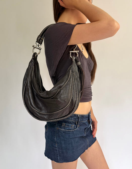 Y2K/2000s black genuine leather hobo bag with silver hardware and tassel detail