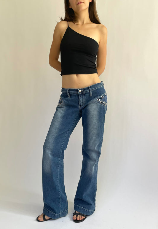 Iconic Y2K low rise flared stretchy jeans with pocket detailing