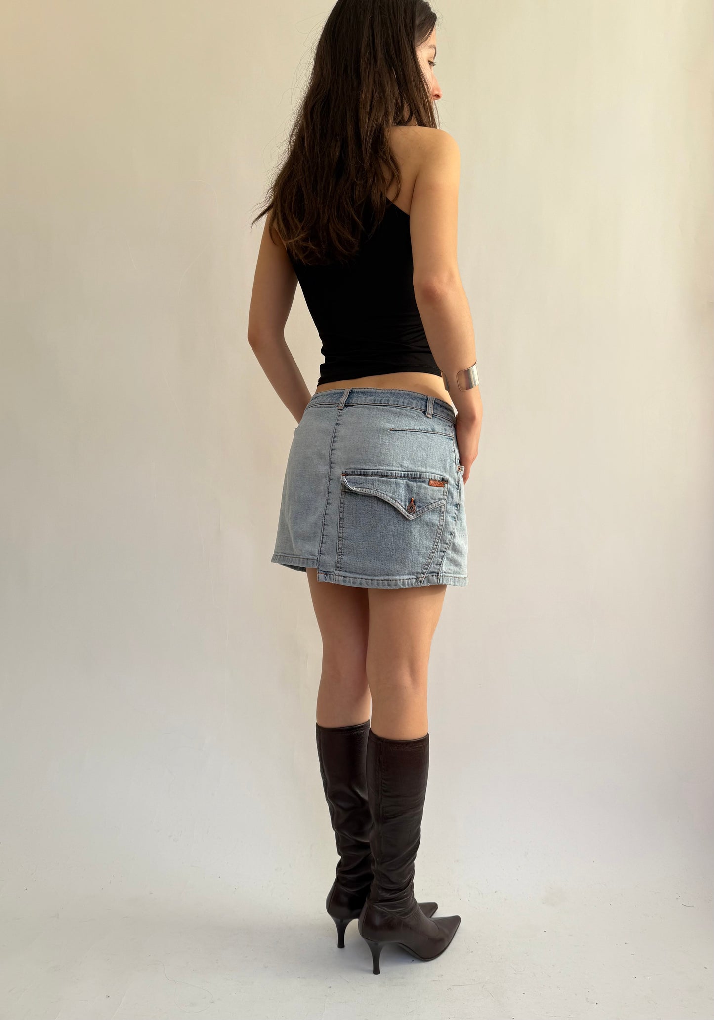 Y2K light wash denim mini skirt with back pocket details