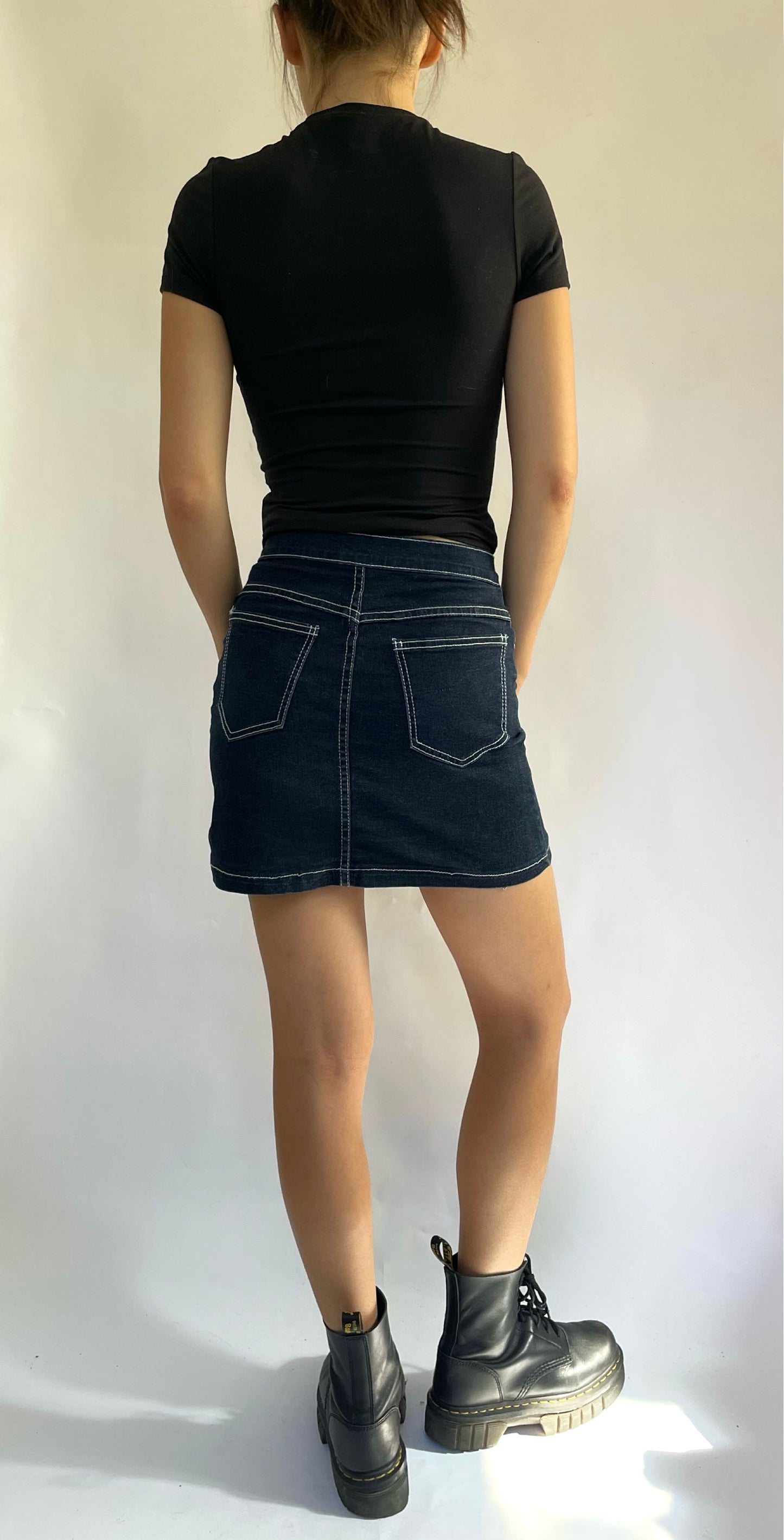 Vintage mini denim skirt with white stitching